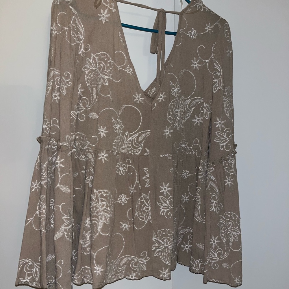 Altered state embroidered top